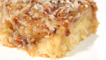 Easy Pineapple Upside Down Cake on a white plate